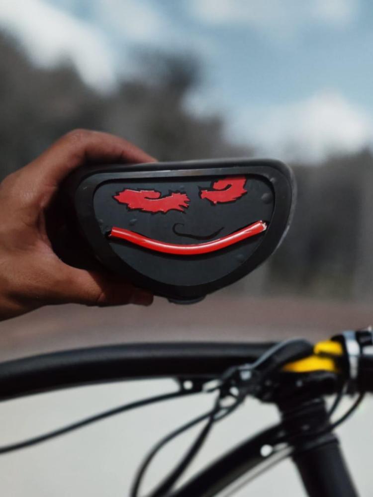 Smile Shape Bike Tail Light – Stylish LED Safety Light (Black & Red)